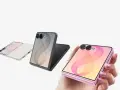 Tre smartphone pieghevoli in colori diversi: rosa, grigio e bianco. Il telefono rosa è tenuto in mano, il che fa pensare che non si sente audio telefono.