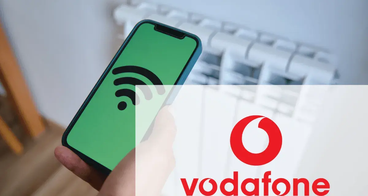 Smartphone con icona Wi-Fi su schermo verde, sovrapposto al logo Vodafone. Un messaggio autoconfigurante Vodafone per la tua connessione.