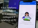 Collegamento al telefono Windows: un laptop e uno smartphone mostrano l'app "Complemento del tuo telefono" che indica la connessione tra i dispositivi.